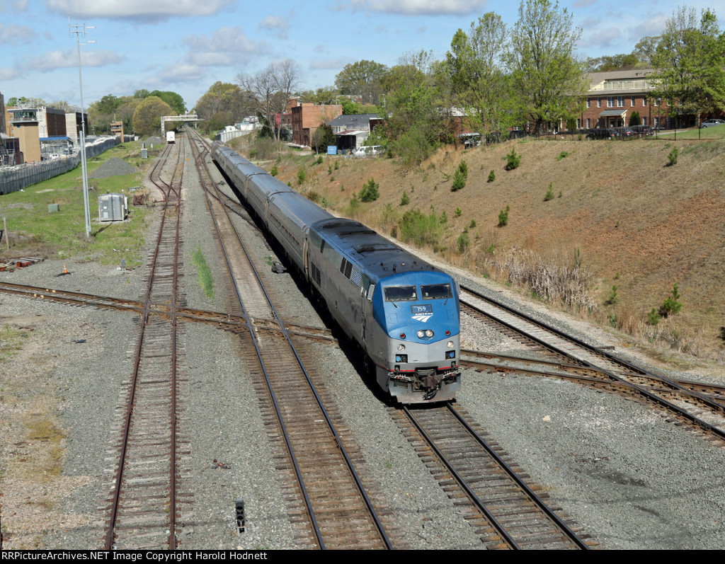 AMTK 159 leads train P080-06 across Boylan Junction